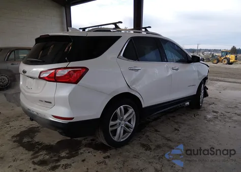 2018 Chevrolet Equinox Premier из США, поврежденный, VIN 2GNAXWEX4J6236921